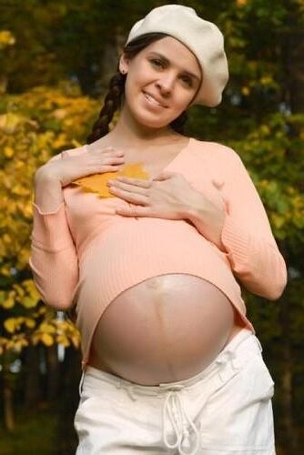 Pregnant Women in Clothes