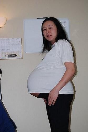 Pregnant Women in Clothes