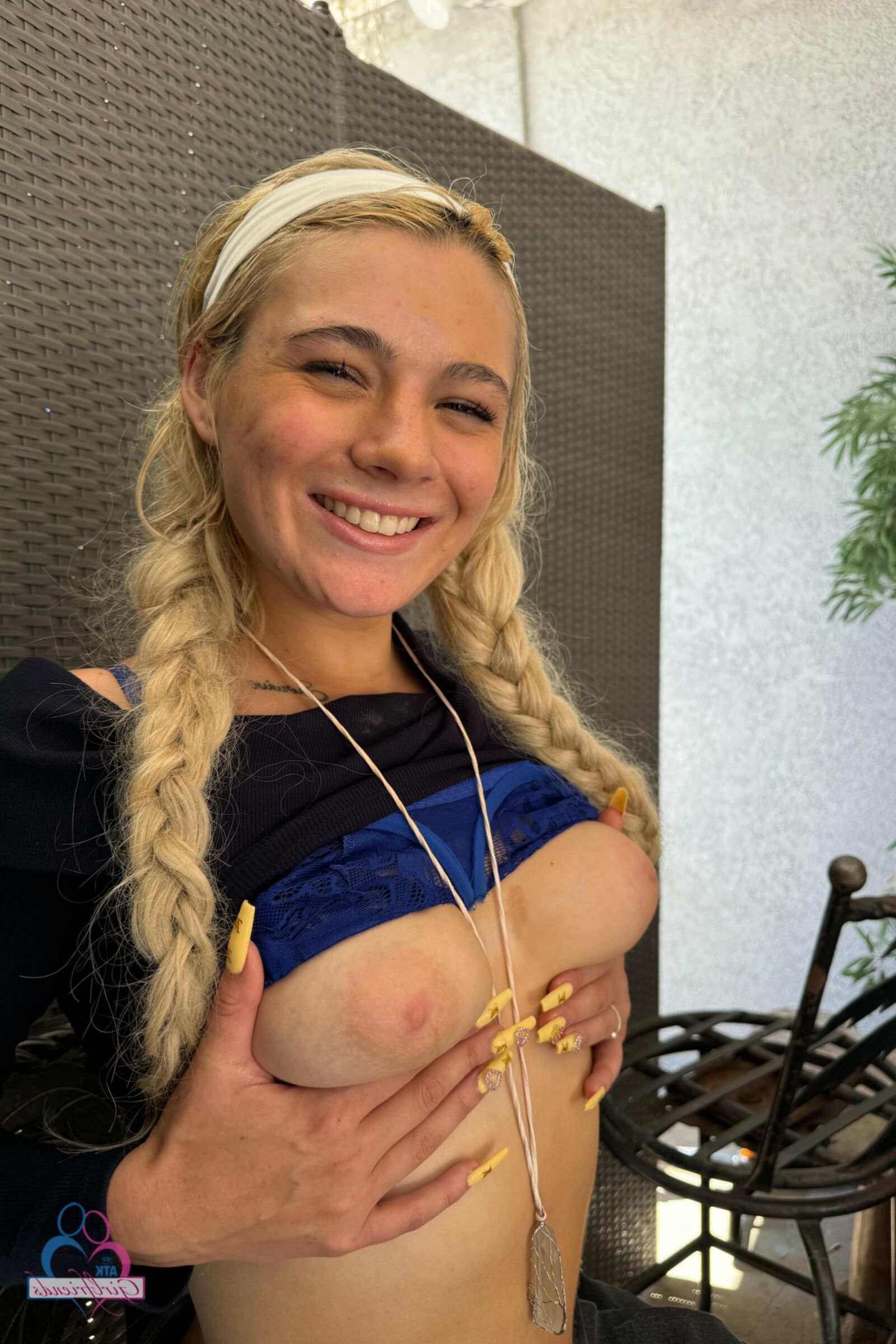 Braided blonde on bed