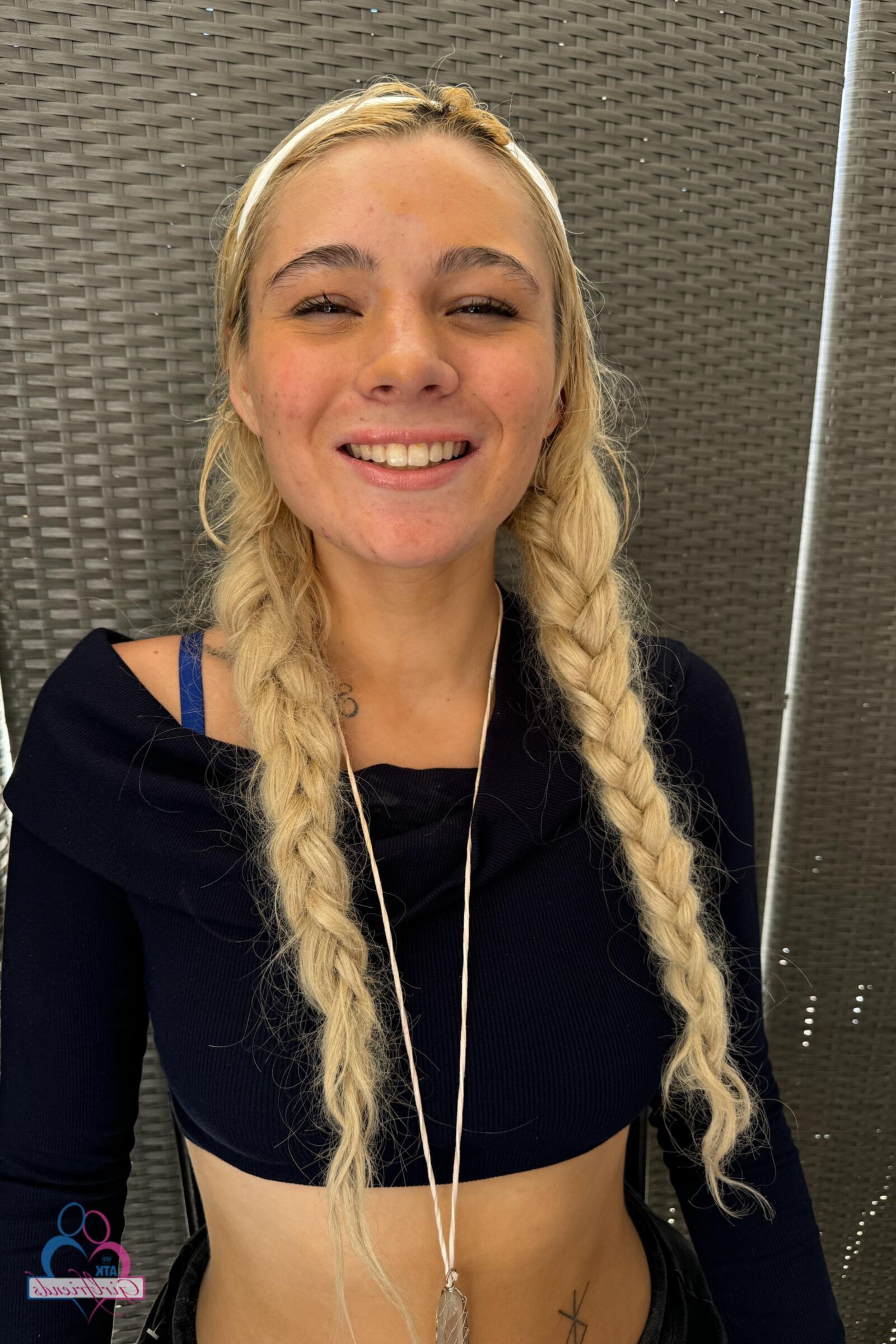 Braided blonde on bed