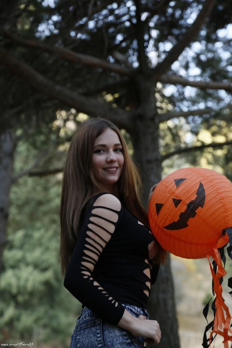 Marvelous Mila undressing in the dark witch wood