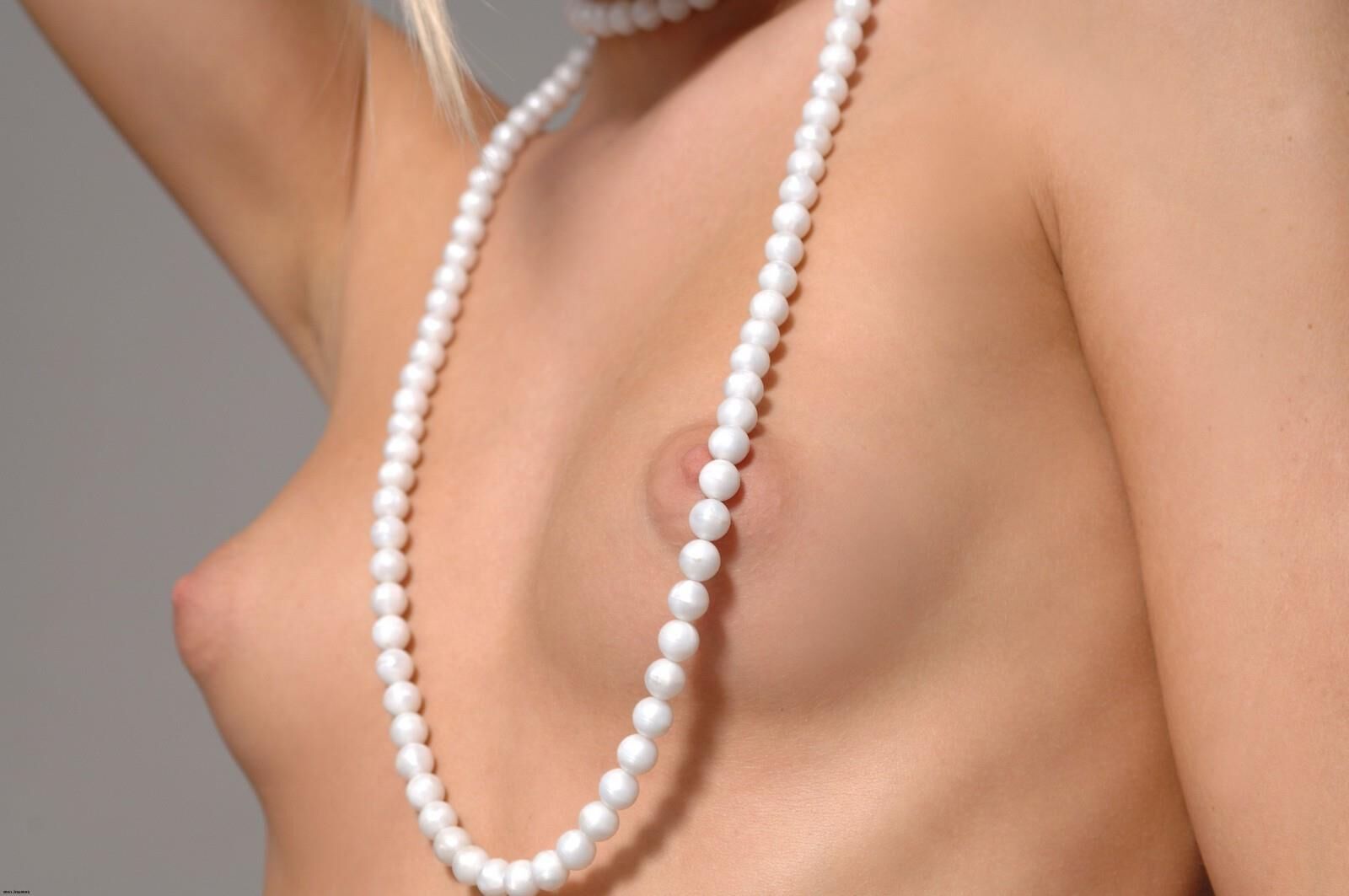 Small tits blond nothing but white pearls