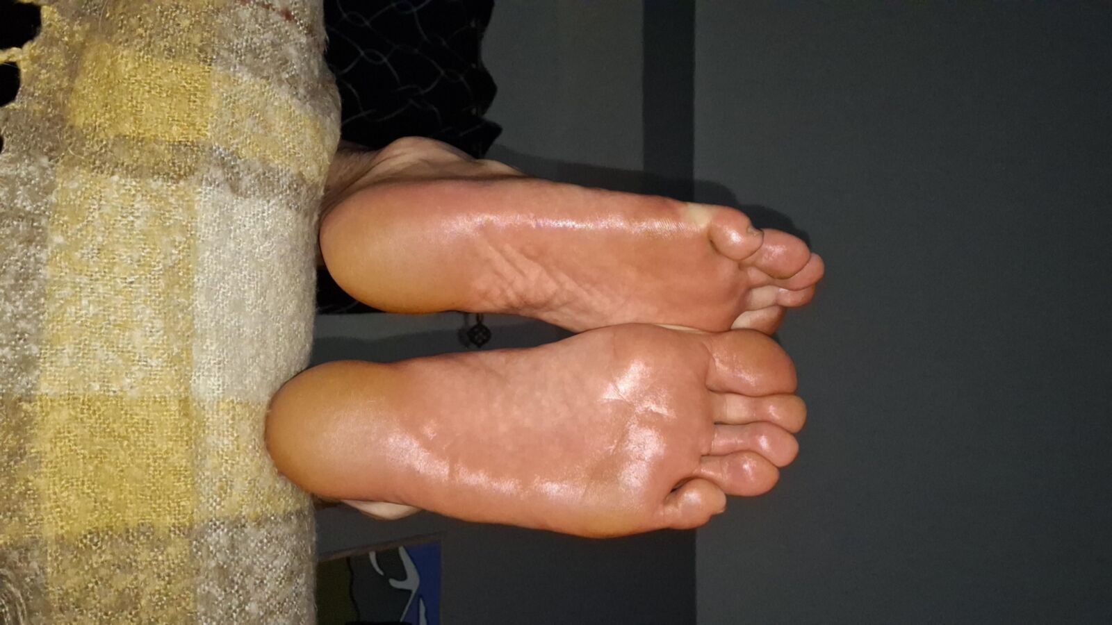 My big, oiled soles in your face 