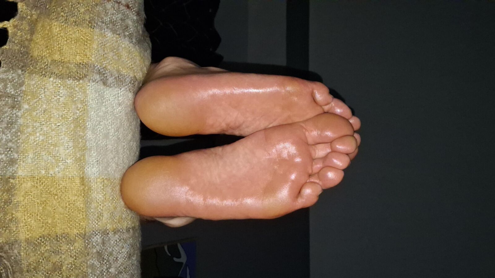 My big, oiled soles in your face 