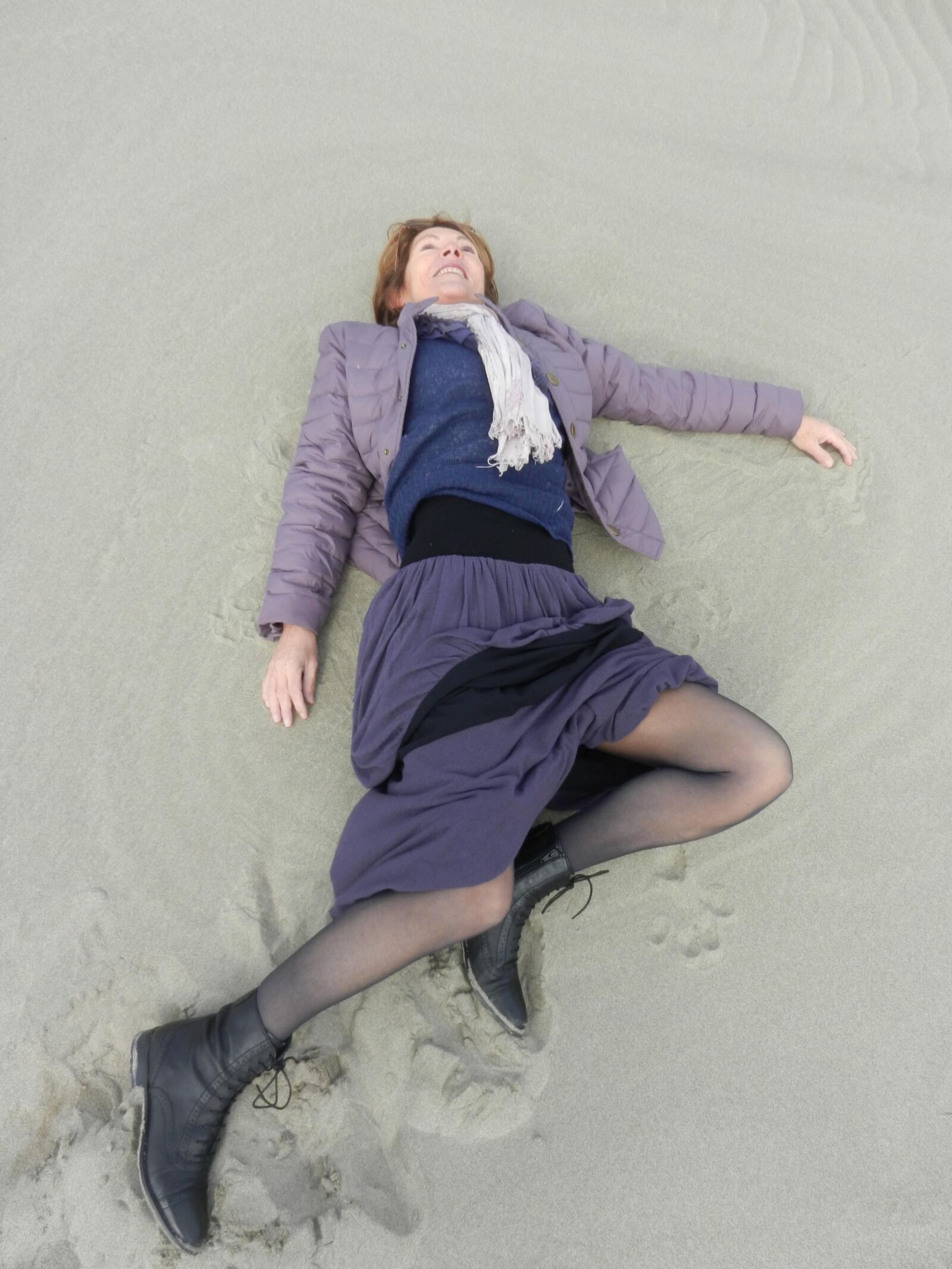 Old granny Annie on a beach in winter HD