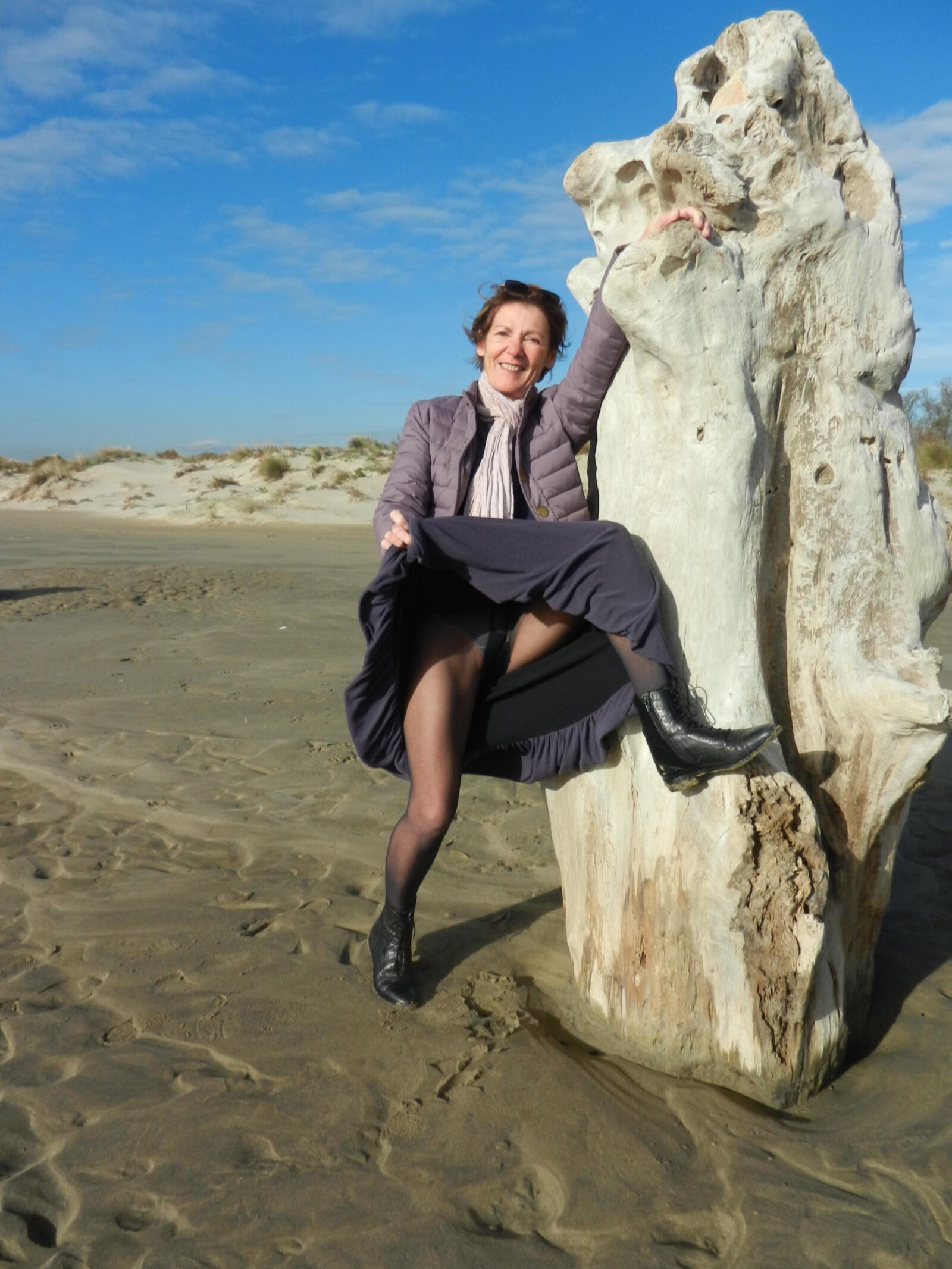 Old granny Annie on a beach in winter HD