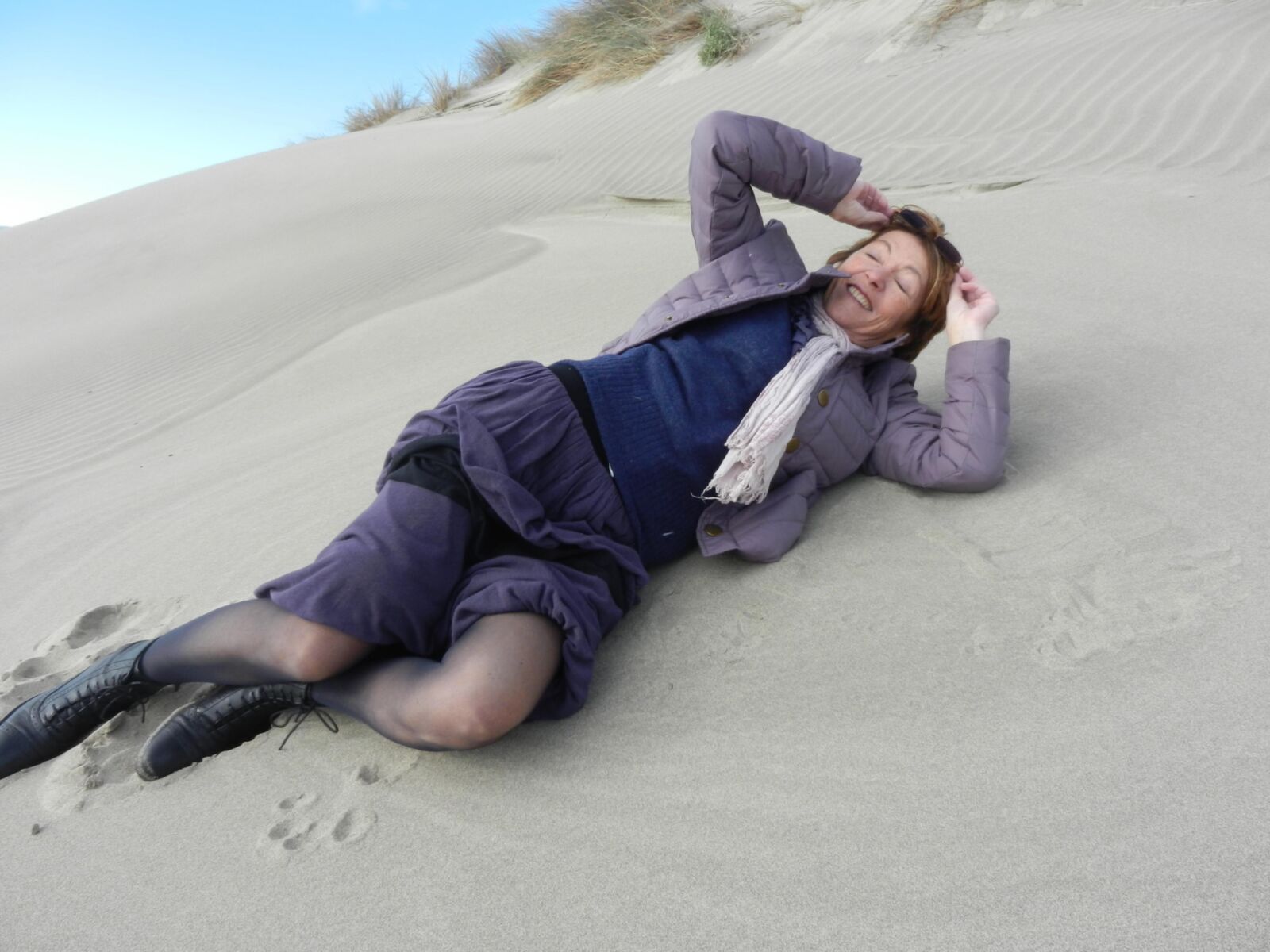 Old granny Annie on a beach in winter HD