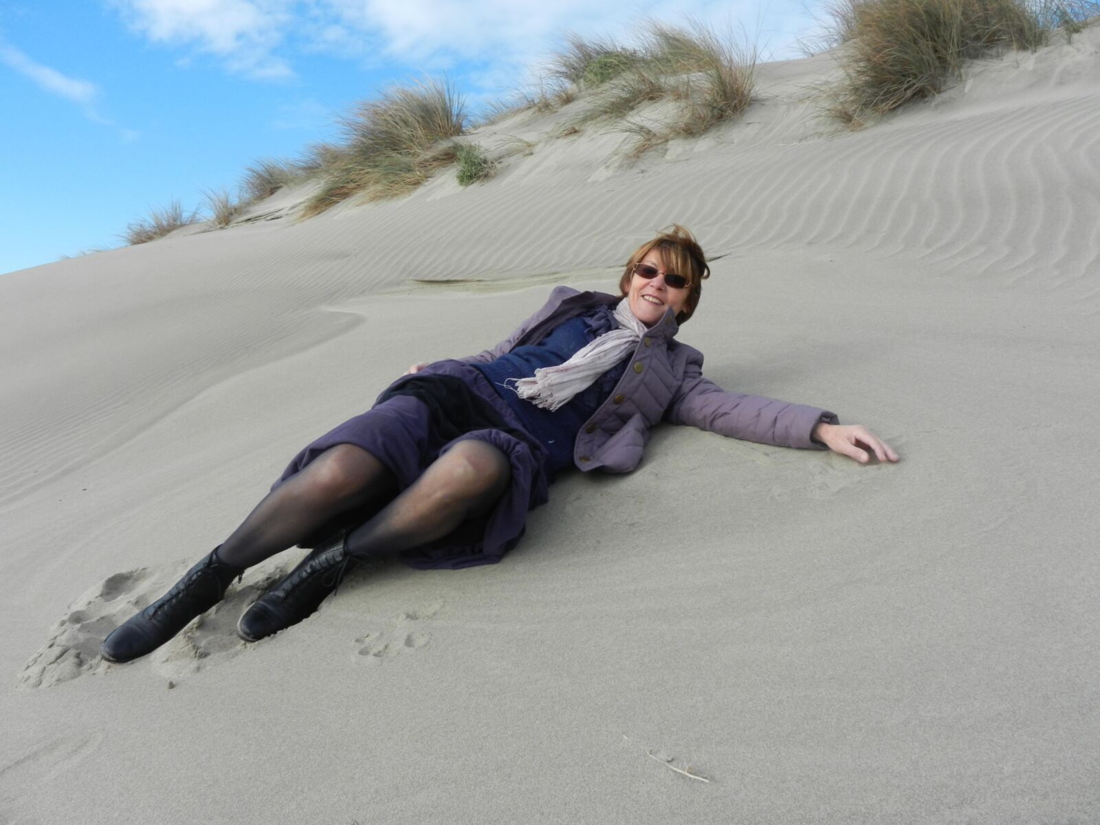 Old granny Annie on a beach in winter HD