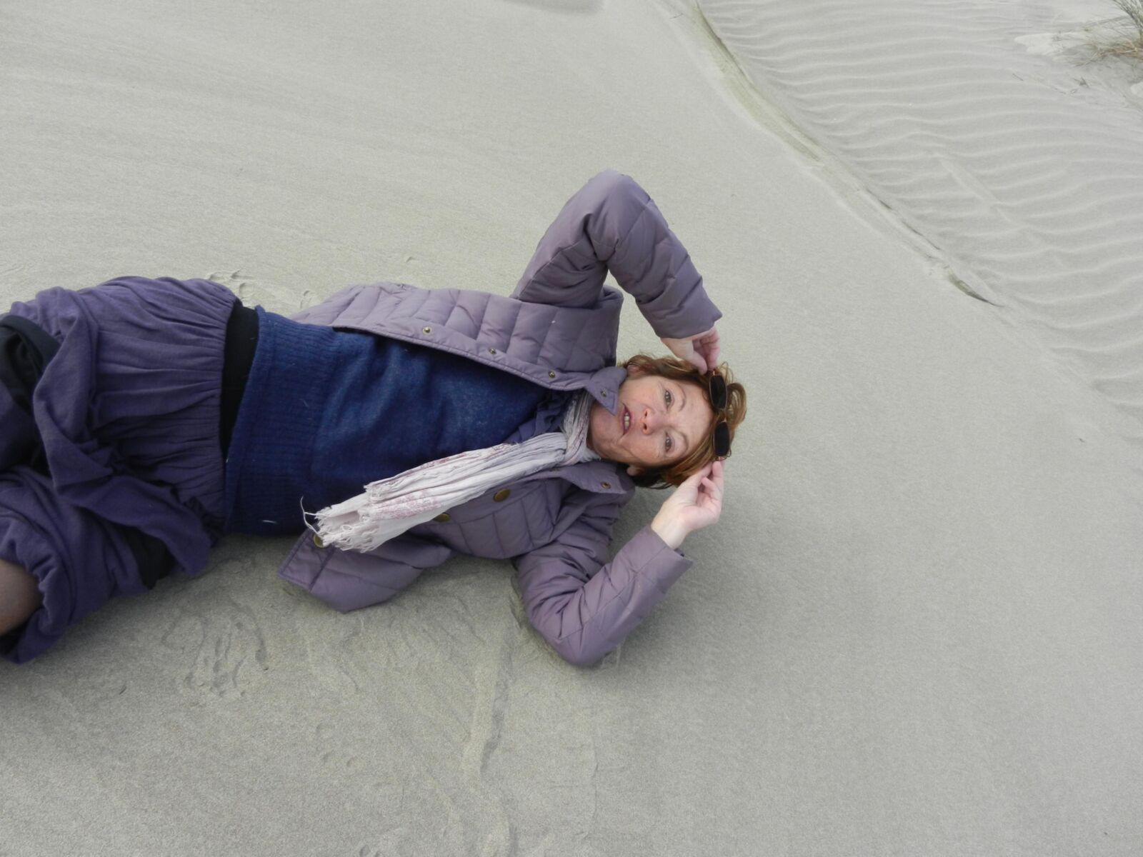 Old granny Annie on a beach in winter HD