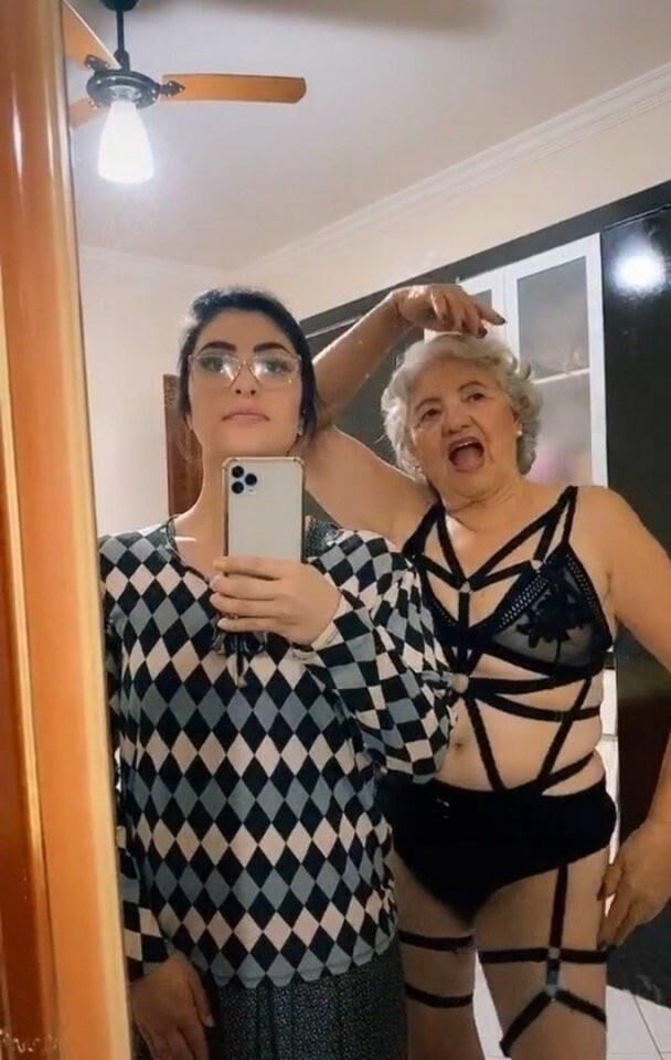 Granny with her granddaughter make funny pics