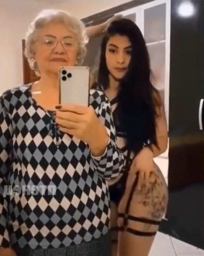 Granny with her granddaughter make funny pics
