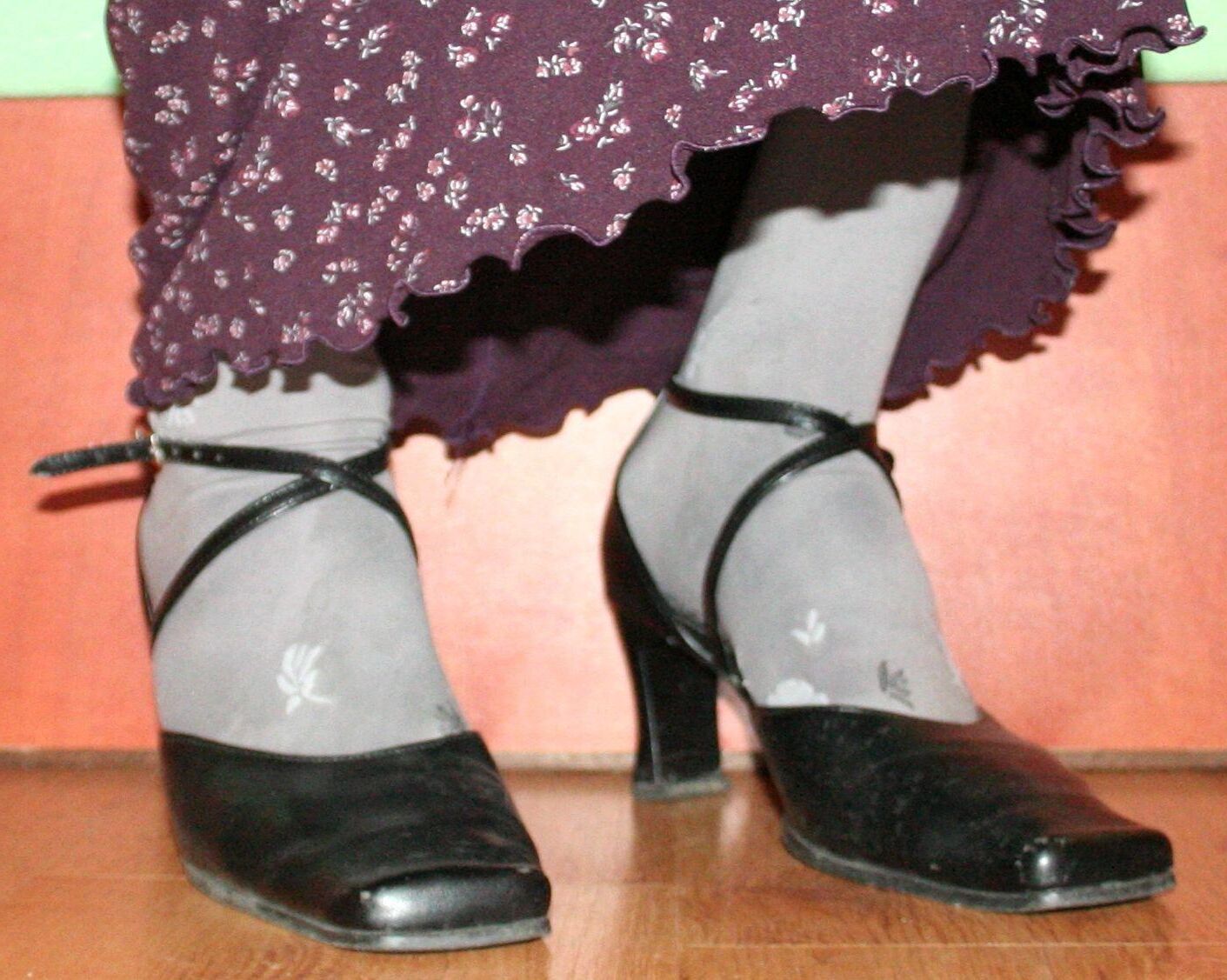 legs in tights with traces of cum in the shoes