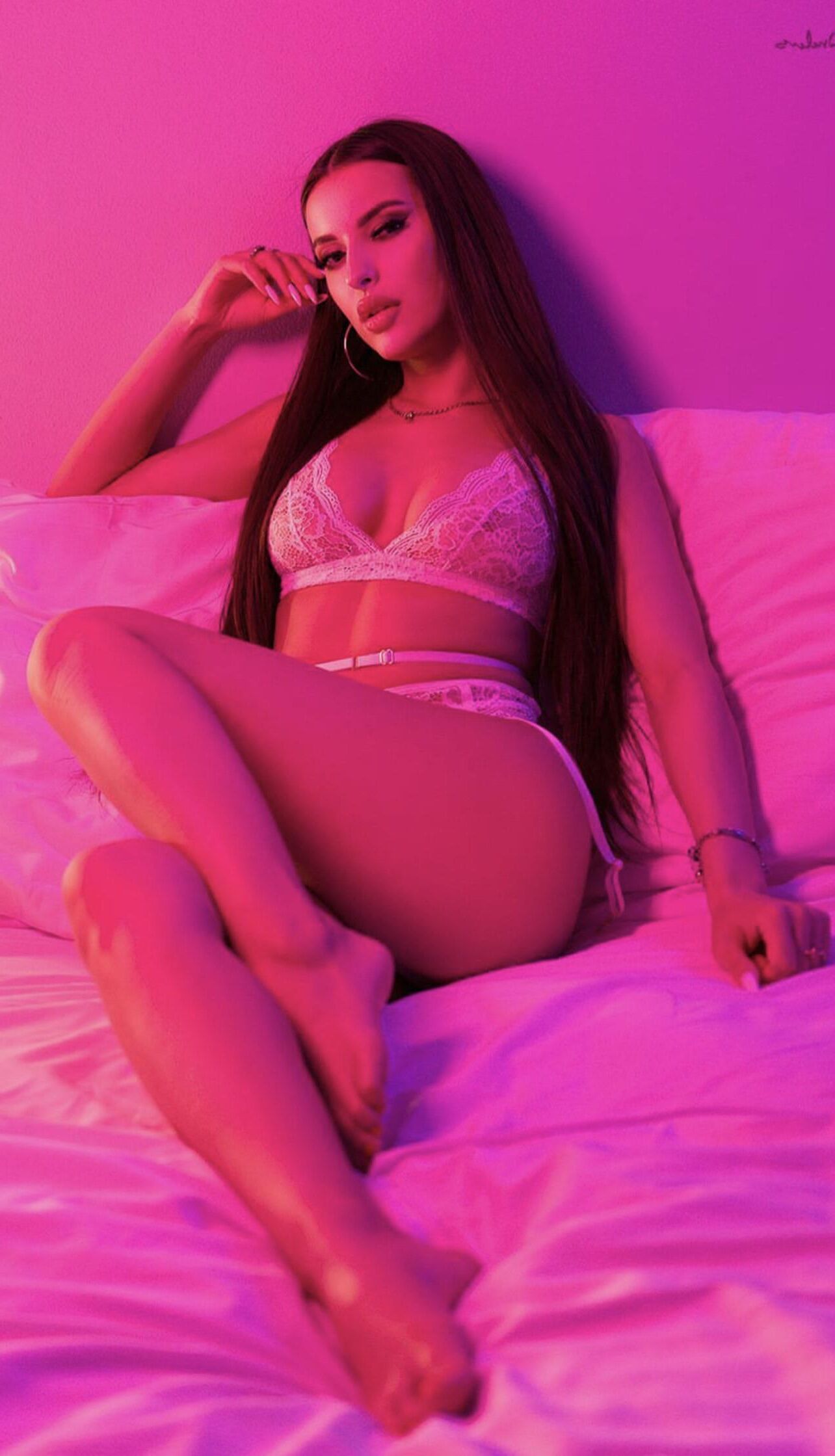 Very hot girl with big boobs posing in lingerie