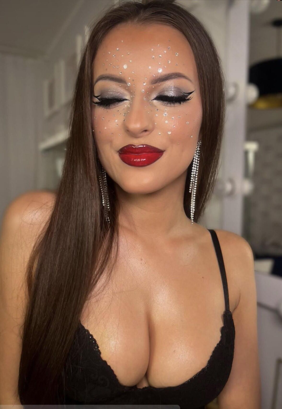 Very hot girl with big boobs posing in lingerie