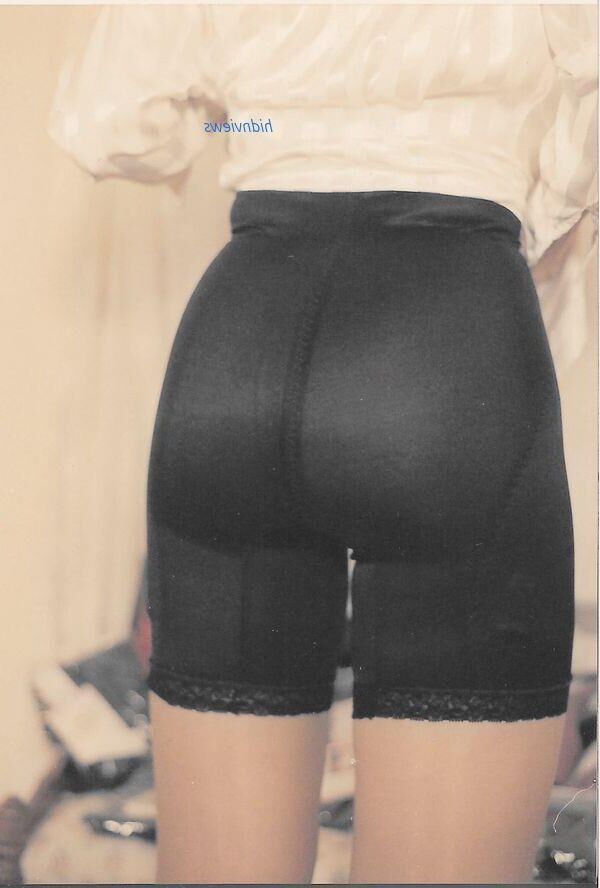 Girdles, An old man's gal in her girdles.