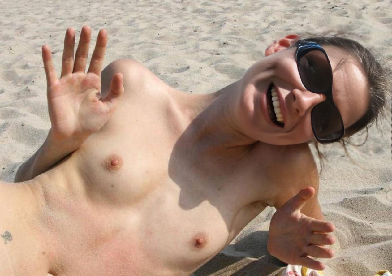 S.U. in her sunglasses on the beach